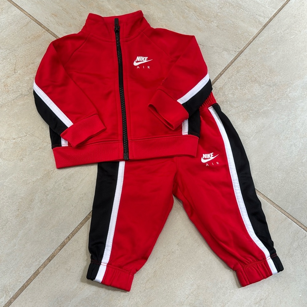 Nike baby boy track suit in red